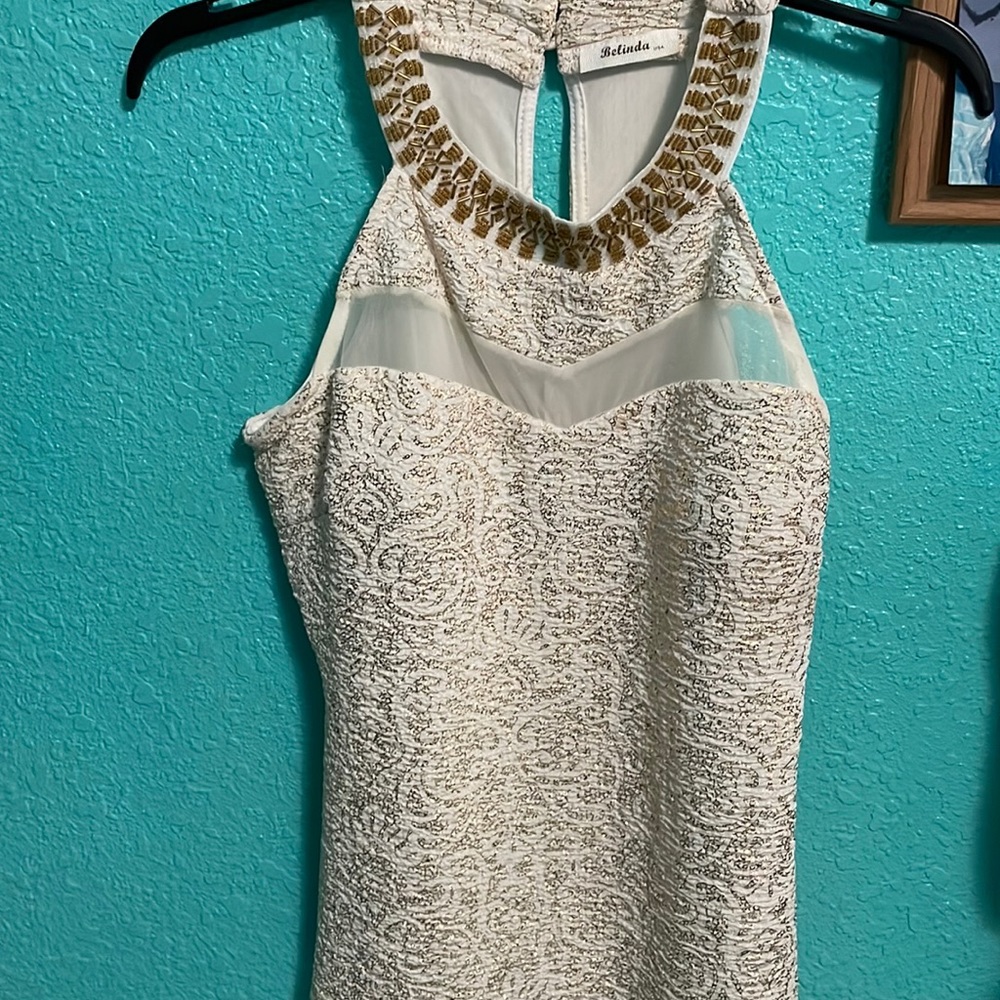 White and gold blouse. Never worn.